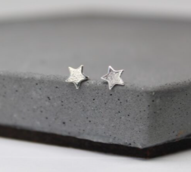 Tiny Silver Star Stud Earrings by Ami Hallgarth