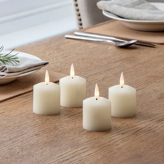 4 TruGlow® Ivory LED Votive Candles