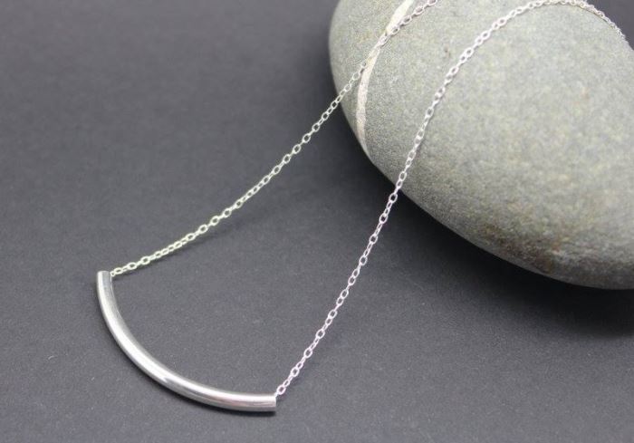 Minimal Silver Curve Necklace by Ami Hallgarth